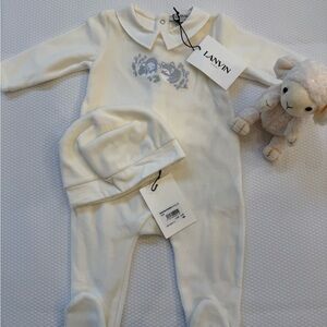 Size 9m, brand new with tags. Footie, hat and stuffed animal included